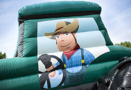 Order covered maxi multifun green bounce house in tractor theme with a slide for children. Buy inflatable bounce houses online at JB Inflatables America