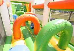 Order an inflatable football themed obstacle course with 7 game elements and colorful objects for kids. Buy inflatable obstacle courses online now at JB Inflatables America