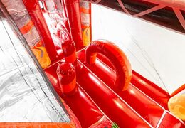Buy a firefighting bouncer in a unique design with two entrances, a slide in the middle and 3D objects for kids. Order bouncers online at JB Inflatables America 