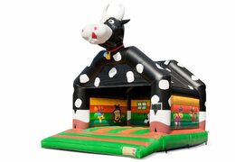 Big bounce house with roof in cow theme for kids. Order bounce houses online at JB Inflatables America