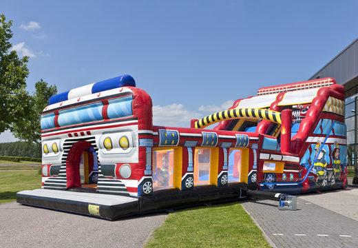 Order an inflatable extra wide Fire Brigade World XL slide with 3D obstacles for children. Buy inflatable slides now online at JB Inflatables America