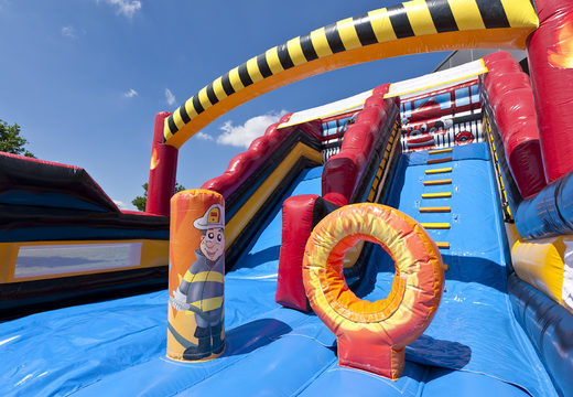 Buy a unique extra wide inflatable slide in the Fire Brigade World theme with 3D obstacles for children. Order inflatable slides now online at JB Inflatables America