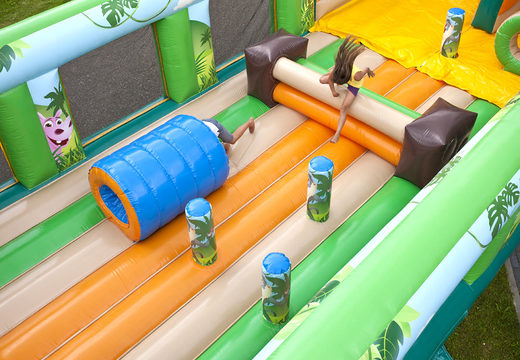 Get your big inflatable Jungle World slide with 3D obstacles for kids. Order inflatable slides now online at JB Inflatables America