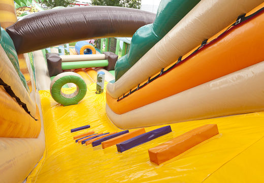 Jungle World slide XL with 3D obstacles for children. Buy inflatable slides now online at JB Inflatables America