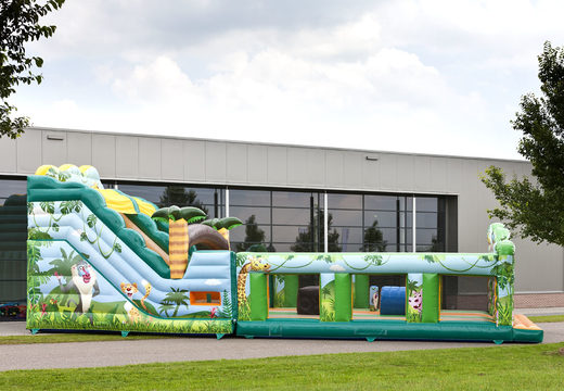 Buy an inflatable extra wide slide in the jungle world theme with 3D obstacles for children. Order inflatable slides now online at JB Inflatables America