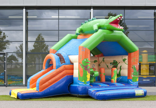 Order covered multifun bouncy castle with slide in crocodile theme with 3D object at the top for both young and older children. Buy inflatable bouncy castles online at JB Inflatables America