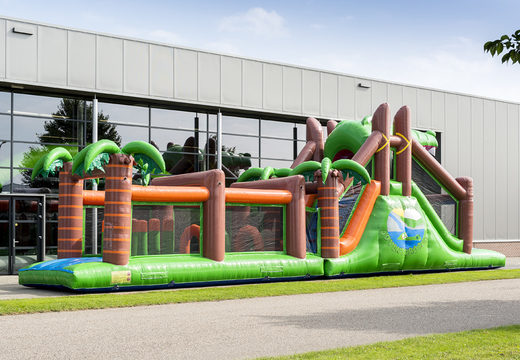 Buy a 17 meter wide inflatable obstacle course in the theme of crocodile with 7 game elements and colorful objects for kids. Order inflatable obstacle courses now online at JB Inflatables America