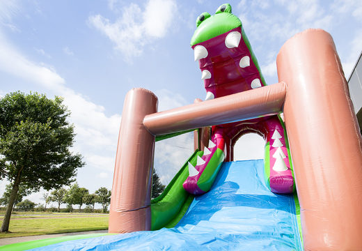 Order an inflatable unique 17 meter wide crocodile themed obstacle course for kids. Order inflatable obstacle courses now online at JB Inflatables America