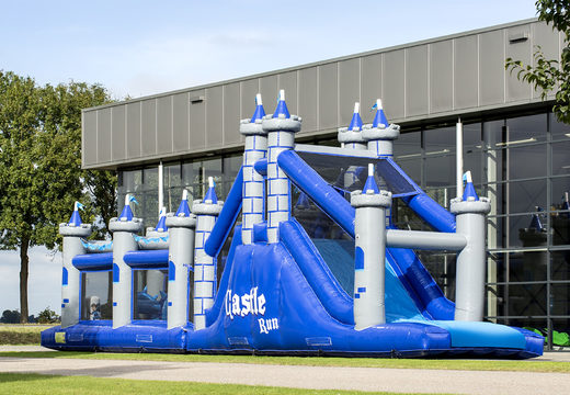 Buy a unique 17 meter wide castle themed obstacle course with 7 game elements and colorful objects for kids. Order inflatable obstacle courses now online at JB Inflatables America