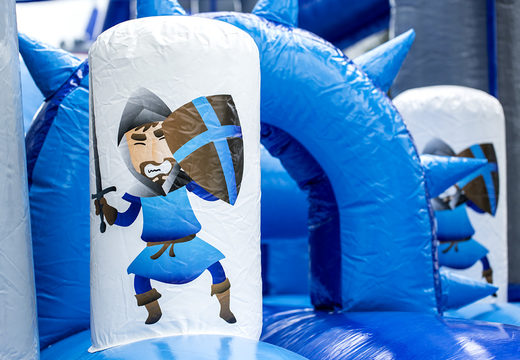 Buy inflatable unique 17 meter wide obstacle course in a castle theme with 7 game elements and colorful objects for children. Order inflatable obstacle courses now online at JB Inflatables America