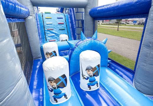 Get your unique 17m wide castle themed obstacle course with 7 game elements and colorful objects now for kids. Order inflatable obstacle courses at JB Inflatables America