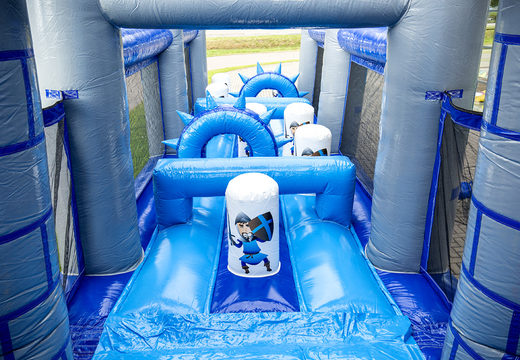 Buy an inflatable castle themed obstacle course with 7 game elements and colorful objects for children. Order inflatable obstacle courses now online at JB Inflatables America