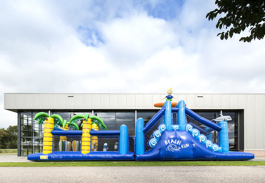 Buy an inflatable unique 17 meter wide surf-themed obstacle course with 7 game elements and colorful objects for children. Order inflatable obstacle courses now online at JB Inflatables America