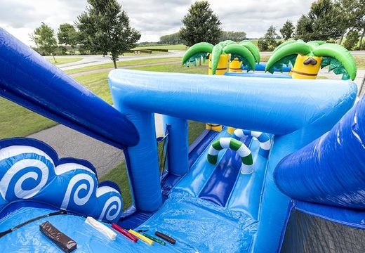 Order a 17 meter wide inflatable obstacle course in the surf theme for children. Buy inflatable obstacle courses online now at JB Inflatables America