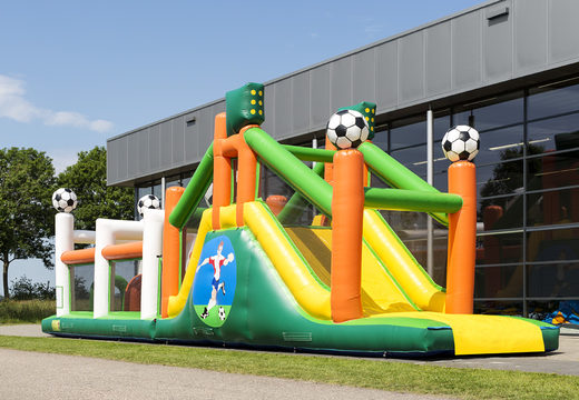 Buy a 17 meter wide inflatable obstacle course in the theme of football with 7 game elements and colorful objects for kids. Order inflatable obstacle courses now online at JB Inflatables America