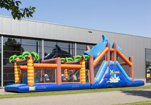 Buy a unique 17 meter wide shark themed obstacle course with 7 game elements and colorful objects for kids. Order inflatable obstacle courses now online at JB Inflatables America