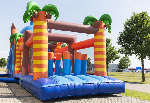 Unique 17 meter wide shark themed obstacle course with 7 game elements and colorful objects for kids. Buy inflatable obstacle courses online now at JB Inflatables America