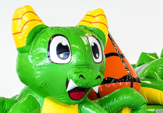 Dragon themed bouncer with slide, fun objects on the jumping surface and eye-catching 3D objects for children. Buy inflatable bouncers online at JB Inflatables America
