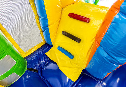 Multiplay dragon bounce house with a slide, fun objects on the jumping surface and striking 3D objects for children. Order inflatable bounce houses online at JB Inflatables America