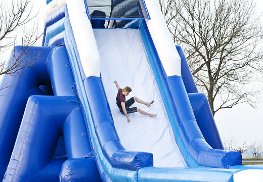 Monster slide 11 meters high and 54 meters long with a double staircase and wide slide. Order inflatable slides now online at JB Inflatables America