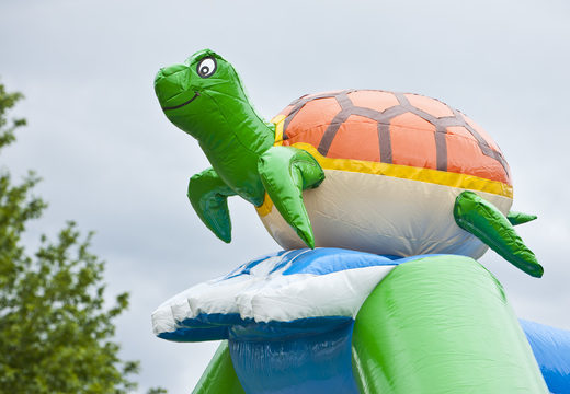 Order an inflatable multifun bounce house for children with a roof, a 3D turtle object, various obstacles and a slide at JB Inflatables America. Buy inflatable bounce houses online at JB Inflatables America