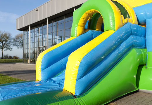 Order an inflatable multifun bounce house with roof and slide in football theme for kids with 3D object at the top at JB Inflatables America. Buy inflatable bounce houses online at JB Inflatables America