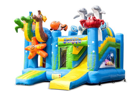Buy indoor inflatable multiplay bounce house in the seaworld sea theme with slide for children. Order inflatable bounce houses online at JB Inflatables America