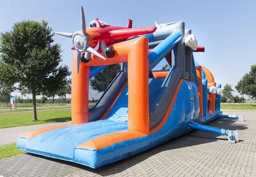 Plane run 17m obstacle course with 7 game elements and colorful objects for kids. Buy inflatable obstacle courses online now at JB Inflatables America