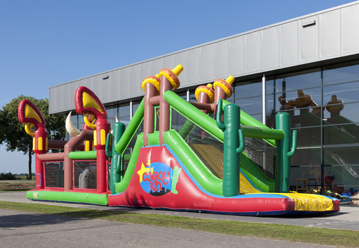 Get your unique 17 meter cowboy themed obstacle course now for kids. Order inflatable obstacle courses at JB Inflatables America