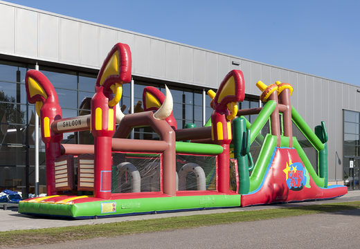 Order a 17 meter wide unique cowboy themed obstacle course for kids. Buy inflatable obstacle courses online now at JB Inflatables America