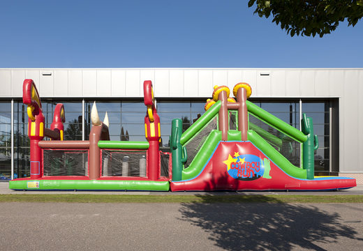 Order a unique 17 meter wide obstacle course in cowboy theme for children. Buy inflatable obstacle courses online now at JB Inflatables America