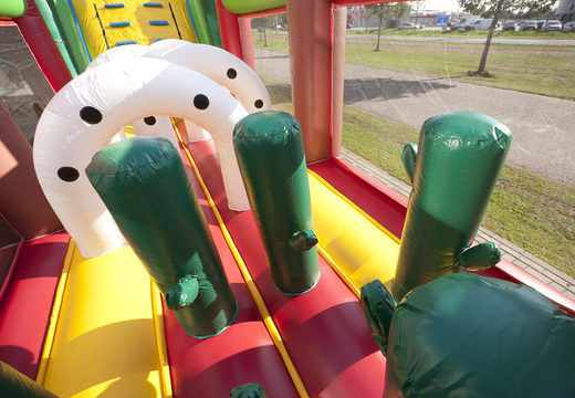 Unique cowboy themed obstacle course with 7 game elements and colorful objects to buy for kids. Order inflatable obstacle courses now online at JB Inflatables America