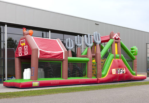 Buy a farm themed inflatable obstacle course with 7 game elements and colorful objects for children. Order inflatable obstacle courses now online at JB Inflatables America