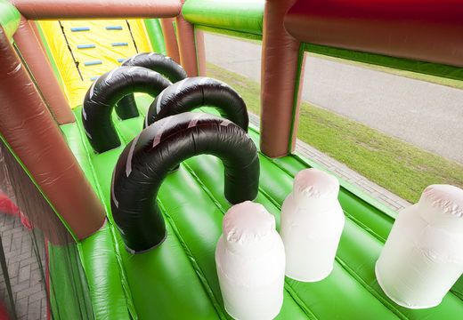 Farm themed inflatable unique 17 meter wide obstacle course with 7 game elements and colorful objects to buy for children. Order inflatable obstacle courses now online at JB Inflatables America