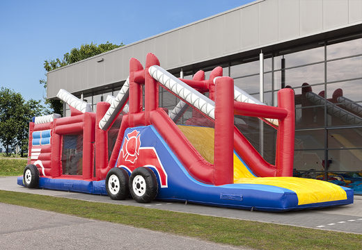 Order a 17 meter wide unique obstacle course in a fire brigade theme with 7 game elements and colorful objects for children. Buy inflatable obstacle courses online now at JB Inflatables America