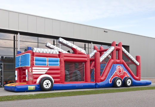 Buy a 17 meter wide inflatable obstacle course in the theme of a fire department with 7 game elements and colorful objects for kids. Order inflatable obstacle courses now online at JB Inflatables America