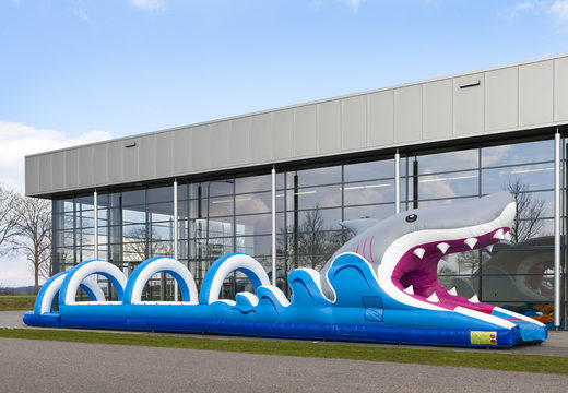 Order a perfect inflatable 18 meter long shark themed belly slide for children. Buy inflatable belly slides now online at JB Inflatables America