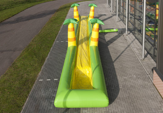 Spectacular inflatable jungle belly slide 16 meters long with an extra wide track for children. Buy inflatable belly slides now online at JB Inflatables America