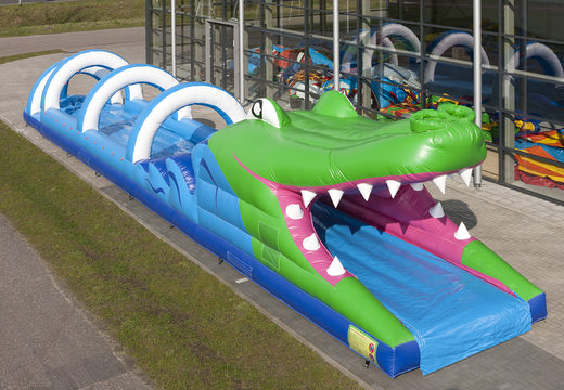 Spectacular inflatable crocodile belly slide 18 meters long for kids. Buy inflatable belly slides now online at JB Inflatables America