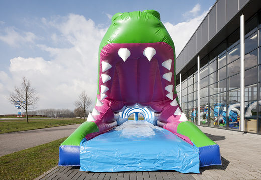 Order an inflatable 18m long belly slide in a crocodile theme for kids. Buy inflatable belly slides now online at JB Inflatables America