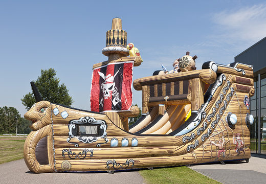 Get a pirate ship themed inflatable slide in an eye-catching shape with cool 3D objects and full color prints for kids. Order inflatable slides now online at JB Inflatables America