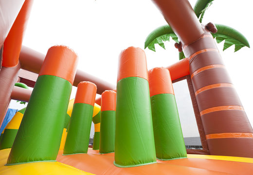 Buy jungle themed inflatable obstacle course with 7 game elements and colorful objects for children. Order inflatable obstacle courses now online at JB Inflatables America