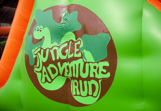 Jungle run 17m obstacle course with 7 game elements and colorful objects for kids. Buy inflatable obstacle courses online now at JB Inflatables America