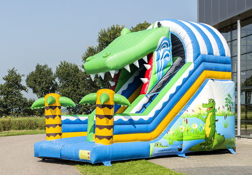 Spectacular inflatable slide in a crocodile theme with cheerful colors for children. Buy inflatable slides now online at JB Inflatables America