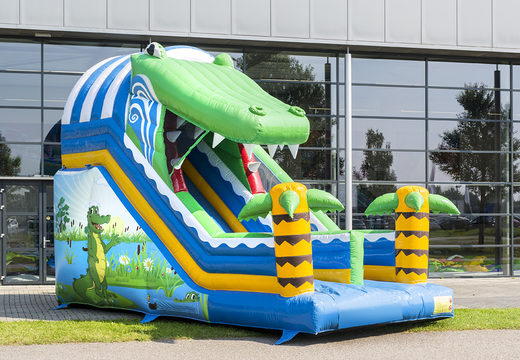 Buy Crocodile slide with the cheerful colors and nice print on the back wall. Order inflatable slides now online at JB Inflatables America