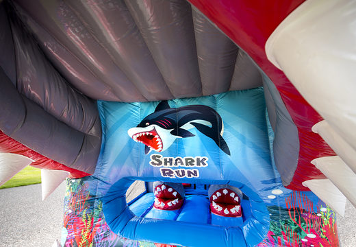 Buy inflatable 8 meter shark themed obstacle course with 3D objects for kids. Order inflatable obstacle courses now online at JB Inflatables America