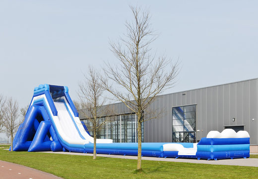 Monsterslide 11 meters high and 53 meters long with a double staircase and wide slide. Order inflatable slides now online at JB Inflatables America
