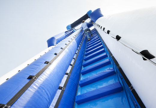 Get your inflatable inflatable monster slide 11 meters high and 53 meters long with a double staircase for children. Order inflatable slides now online at JB Inflatables America