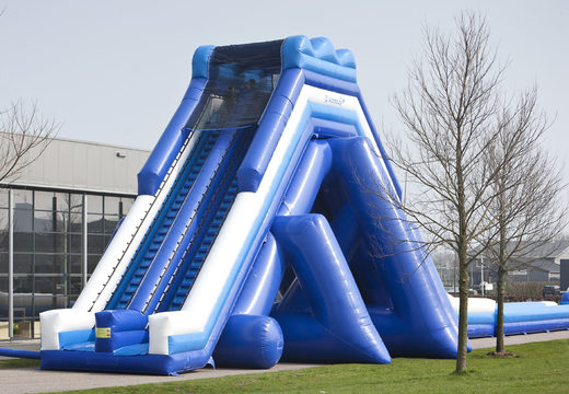 Buy the perfect inflatable slide 11 meters high and 53 meters long with a double staircase. Order inflatable slides now online at JB Inflatables America