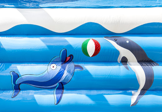 Order indoor multifun bouncer with slide in the dolphin theme with 3D object at the top for children. Buy bouncers online at JB Inflatables America